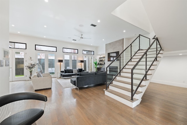 2703 Westgrove Ln, Houston, TX 77027 - living room with recessed lighting, stairway, and a healthy amount of sunlight