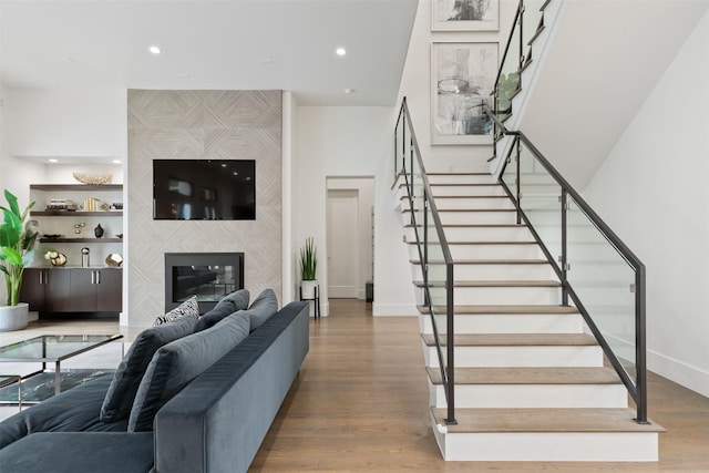 2703 Westgrove Ln, Houston, TX 77027 - living room with wood finished floors, recessed lighting, and stairway