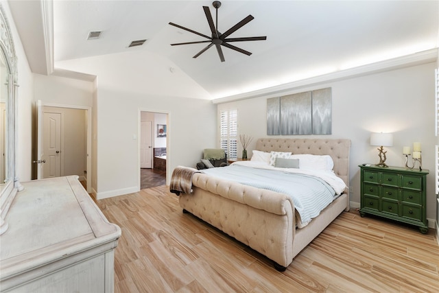 bedroom with ceiling fan, vaulted ceiling, visible vents, and light wood-type flooring