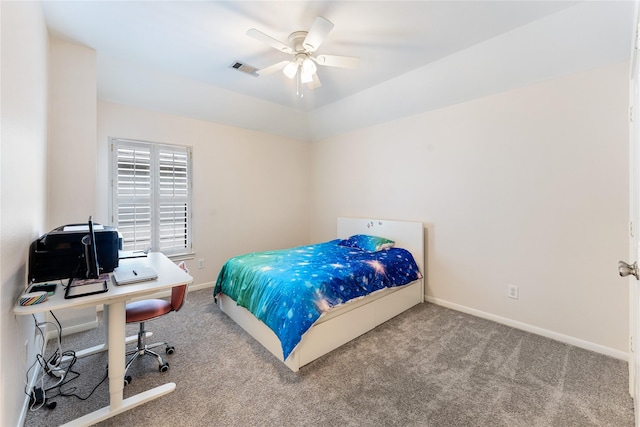 bedroom featuring baseboards, a ceiling fan, visible vents, and carpet