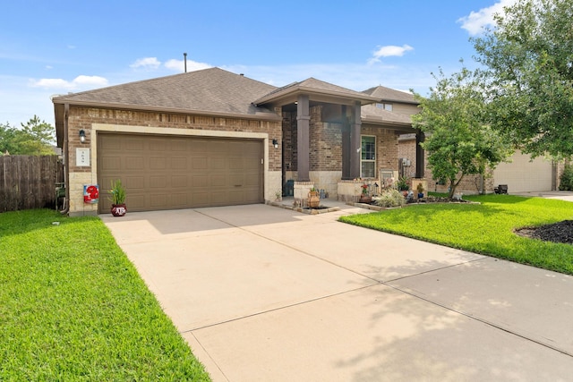 3639 Daintree Park Dr, Katy, TX 77494 - view of front of property with brick siding, an attached garage, driveway, and a shingled roof