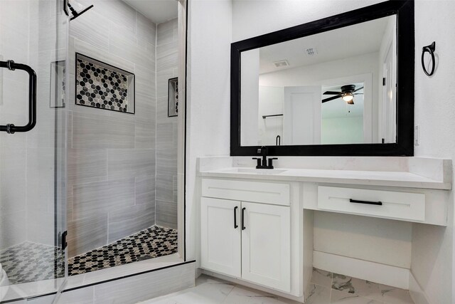 7810 Blackjack Ct, Houston, TX 77088 - bathroom featuring vanity, marble finish floor, a shower stall, and a ceiling fan