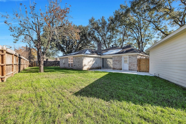 7810 Blackjack Ct, Houston, TX 77088 - view of yard featuring a fenced backyard and a patio area