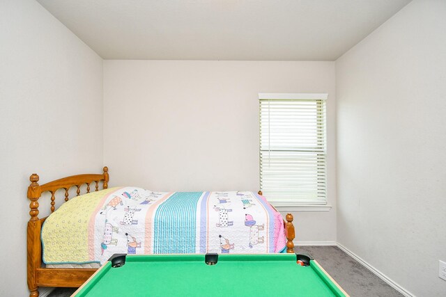 bedroom featuring baseboards, carpet, and billiards