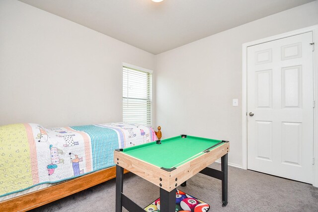 game room featuring carpet floors and baseboards
