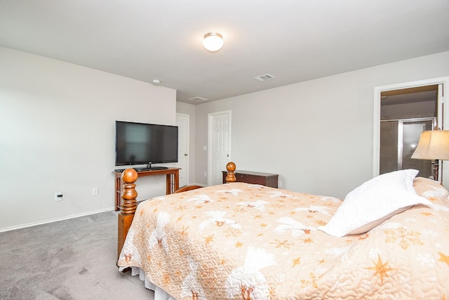 carpeted bedroom with visible vents and baseboards