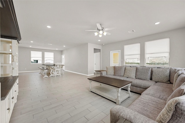 269 Bay Oaks Dr, La Porte, TX 77571 - living room featuring visible vents, baseboards, recessed lighting, and ceiling fan