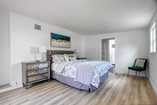 4716 Siegel St, Houston, TX 77009 - bedroom with baseboards, light wood-type flooring, and visible vents