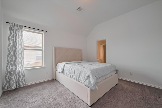 carpeted bedroom featuring vaulted ceiling, visible vents, and baseboards