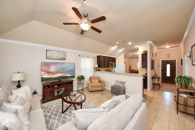 living area featuring a ceiling fan, light tile patterned flooring, crown molding, and vaulted ceiling