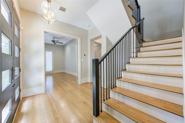 1509 Caywood Ln Unit C, Houston, TX 77055 - stairs featuring wood finished floors, baseboards, and a ceiling fan