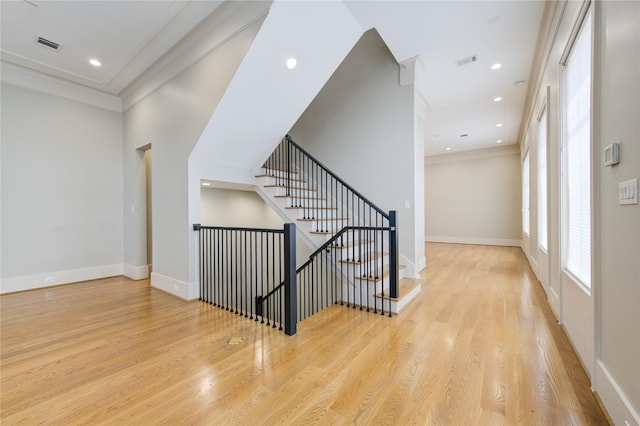 1509 Caywood Ln Unit C, Houston, TX 77055 - corridor featuring wood finished floors, recessed lighting, baseboards, crown molding, and stairs