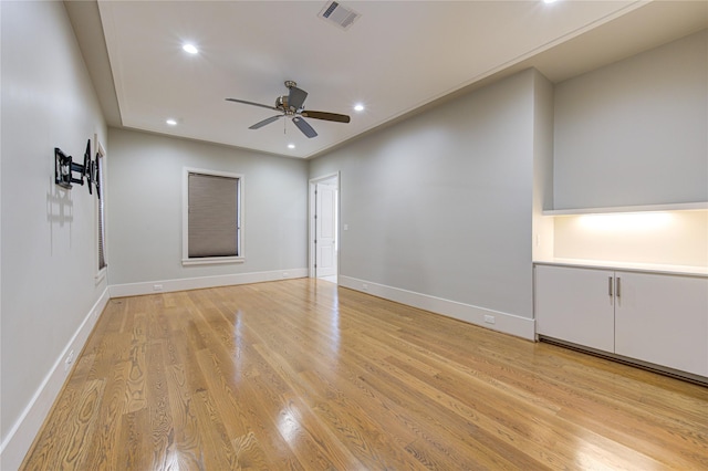 1509 Caywood Ln Unit C, Houston, TX 77055 - spare room featuring a ceiling fan, light wood-style flooring, recessed lighting, and baseboards