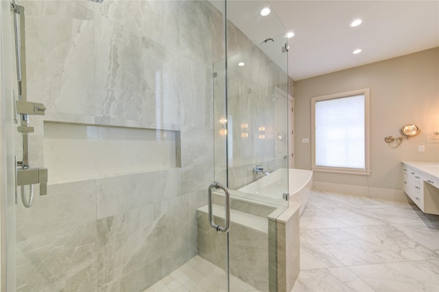 1509 Caywood Ln Unit C, Houston, TX 77055 - bathroom with a stall shower, a freestanding bath, recessed lighting, marble finish flooring, and vanity