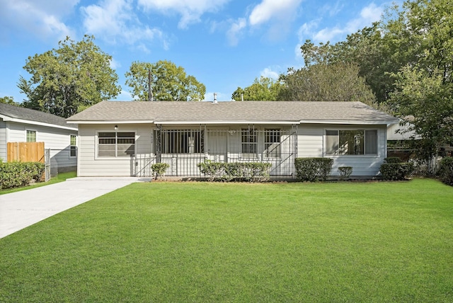 3629 Corksie St, Houston, TX 77051 - ranch-style home with fence, a front lawn, covered porch, and roof with shingles