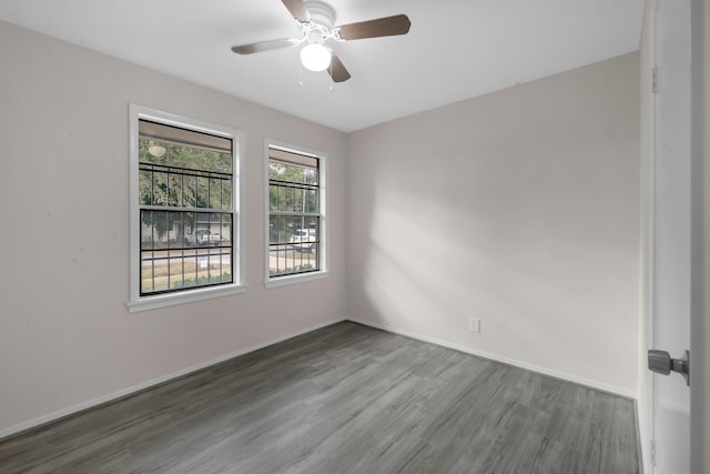 3629 Corksie St, Houston, TX 77051 - spare room featuring baseboards, a ceiling fan, and wood finished floors