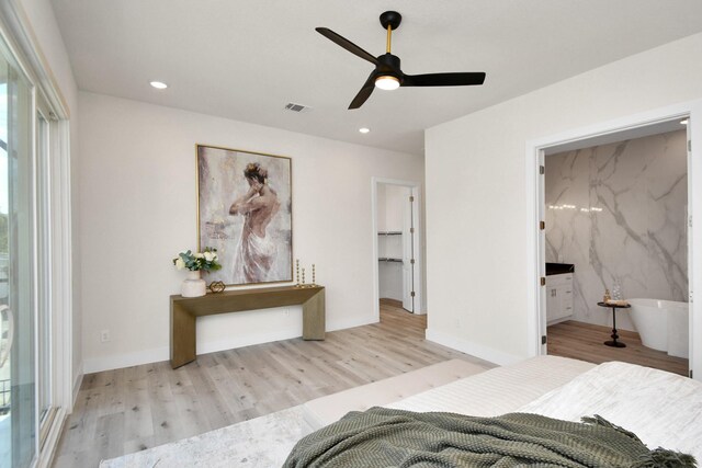bedroom featuring wood finished floors, ceiling fan, baseboards, visible vents, and recessed lighting