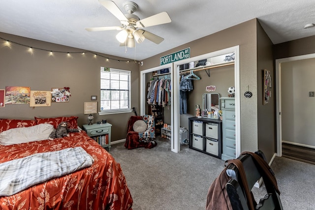 carpeted bedroom with baseboards, ceiling fan, and a closet