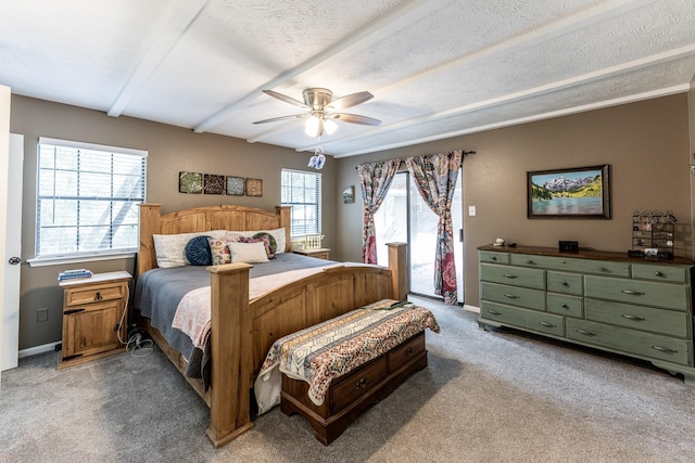 bedroom featuring ceiling fan, access to exterior, beam ceiling, baseboards, and light carpet