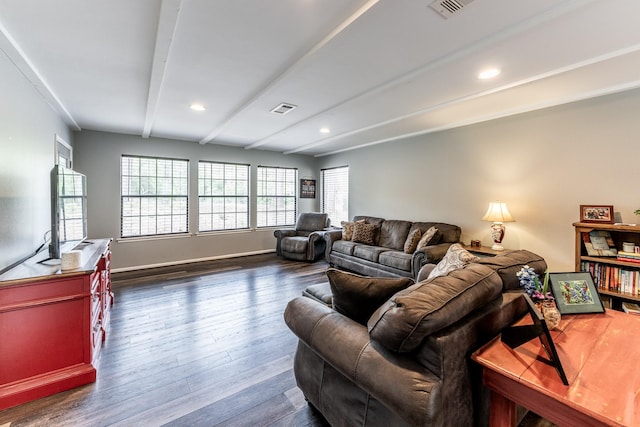 living room featuring dark wood-style flooring, visible vents, beam ceiling, and recessed lighting