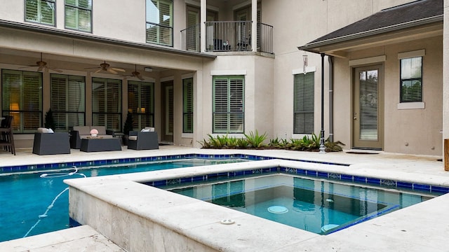 outdoor pool with a patio, an in ground hot tub, ceiling fan, and an outdoor living space