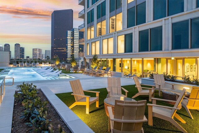 5656 San Felipe St Unit 603, Houston, TX 77056 - exterior space with a patio area, a view of city, and a swimming pool
