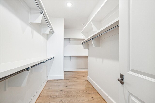 5656 San Felipe St Unit 603, Houston, TX 77056 - spacious closet with light wood finished floors