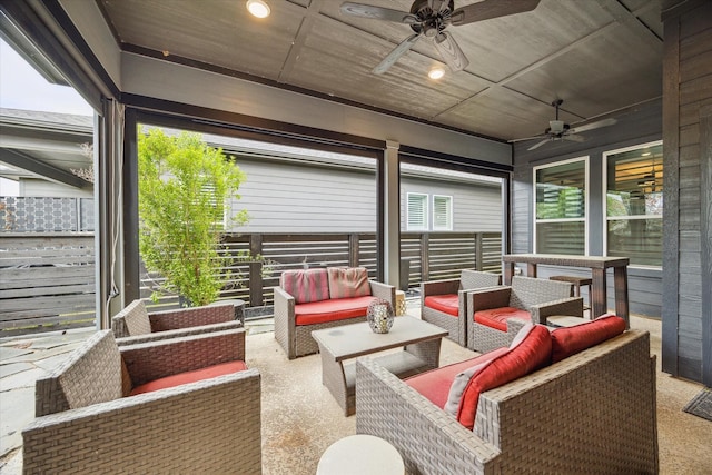 view of patio with an outdoor hangout area and a ceiling fan