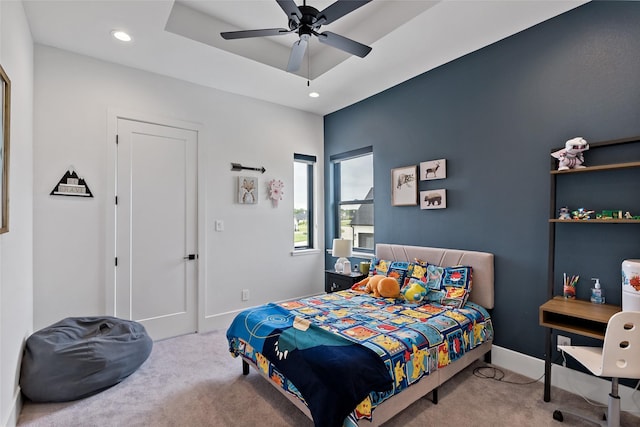 carpeted bedroom with ceiling fan, baseboards, and recessed lighting
