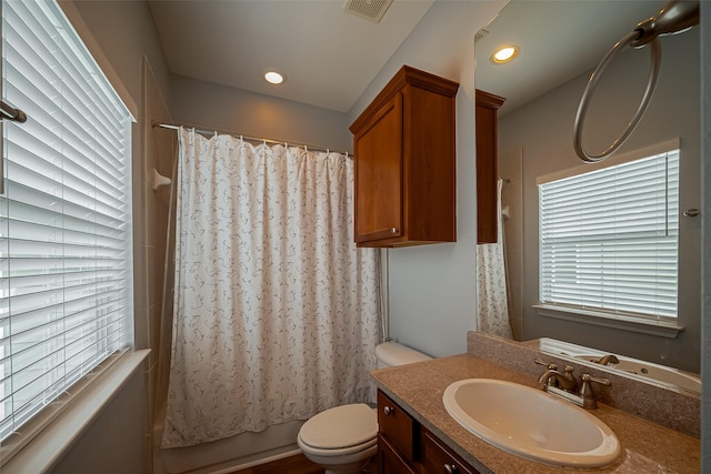 3001 Murworth Dr Unit 902, Houston, TX 77025 - bathroom with toilet, vanity, shower / bathtub combination with curtain, and recessed lighting
