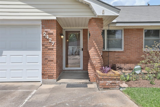 2427 Willowby Dr, Houston, TX 77008 - property entrance featuring brick siding and concrete driveway