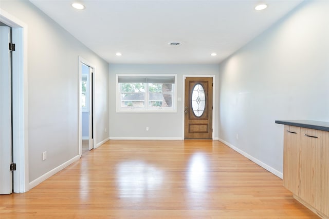 2427 Willowby Dr, Houston, TX 77008 - entryway with baseboards, light wood finished floors, and recessed lighting