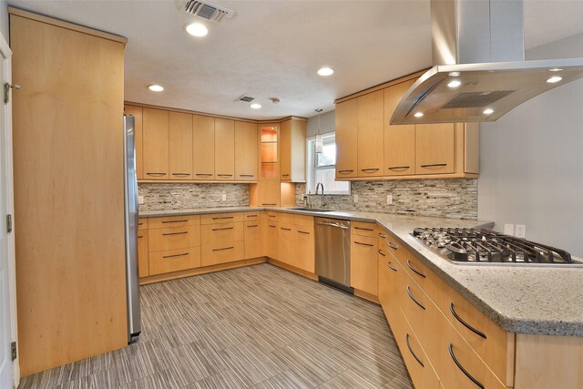 2427 Willowby Dr, Houston, TX 77008 - kitchen with stainless steel appliances, island exhaust hood, a sink, visible vents, and light brown cabinets