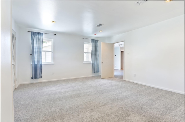 2427 Willowby Dr, Houston, TX 77008 - interior space featuring light colored carpet, baseboards, and visible vents