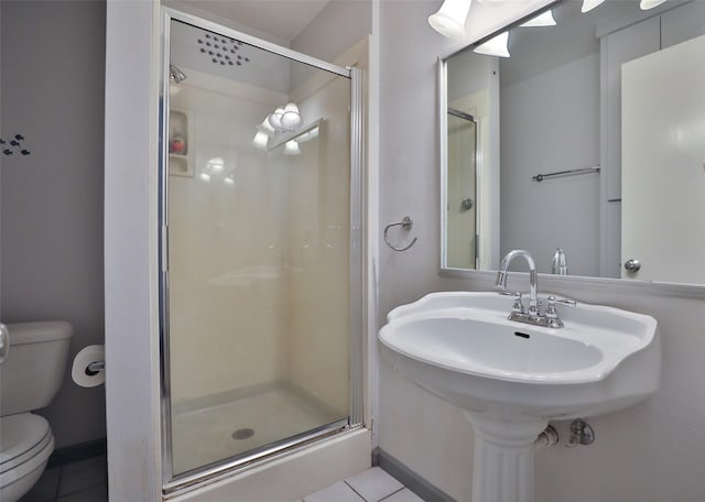 2427 Willowby Dr, Houston, TX 77008 - bathroom with a stall shower, tile patterned floors, and toilet