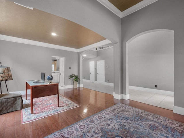 5410 Bur Oak Dr, Pasadena, TX 77505 - office with crown molding, wood finished floors, arched walkways, and recessed lighting