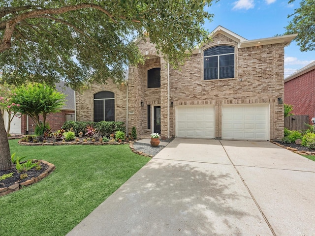 5410 Bur Oak Dr, Pasadena, TX 77505 - traditional-style home with driveway, a garage, a front yard, and brick siding