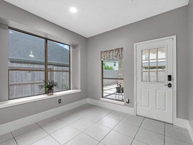 5410 Bur Oak Dr, Pasadena, TX 77505 - entryway with light tile patterned floors and recessed lighting