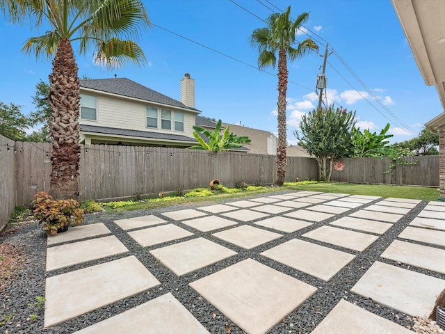 5410 Bur Oak Dr, Pasadena, TX 77505 - fenced backyard featuring a patio