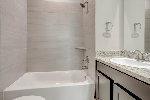 full bath featuring vanity and shower / tub combination