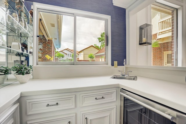 interior space with a sink and wine cooler