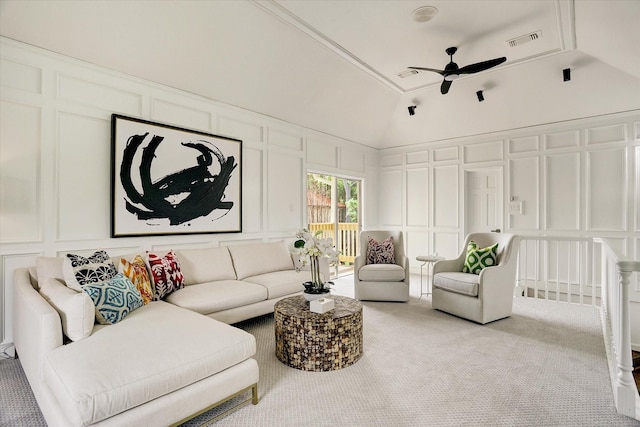 living room with visible vents, high vaulted ceiling, ceiling fan, a decorative wall, and carpet floors