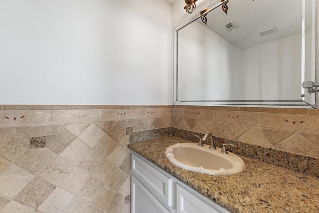 23056 Volga Dr, Porter, TX 77365 - bathroom featuring visible vents and vanity