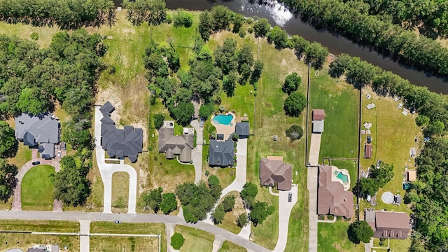 23056 Volga Dr, Porter, TX 77365 - drone / aerial view featuring a water view