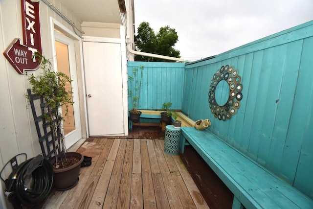 6413 Ella Lee Ln, Houston, TX 77057 - mudroom featuring hardwood / wood-style floors and wood walls