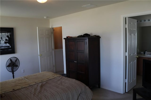bedroom featuring baseboards and carpet flooring