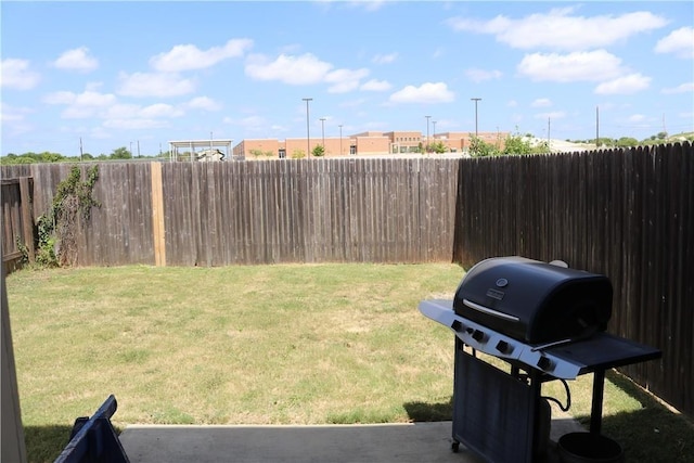 view of yard featuring a fenced backyard