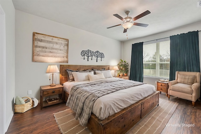 bedroom with ceiling fan, visible vents, and dark wood-style flooring