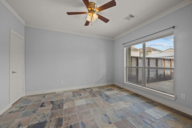 5212 Lillian St, Houston, TX 77007 - unfurnished room with stone tile floors, ornamental molding, a ceiling fan, and baseboards