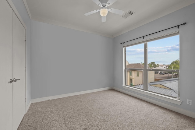 5212 Lillian St, Houston, TX 77007 - unfurnished room with carpet, ornamental molding, ceiling fan, and baseboards